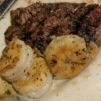 Vella's Restaurant & Tavern - Half of the steak and grilled shrimp - American Near Me - Cayce, South Carolina Vella's Restaurant & Tavern - Half of the steak and grilled shrimp - American Near Me - Cayce, South Carolina