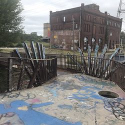Rootwad Park bridge, looking toward the historic St. Louis Refrigeration & Cold Storage Power Plant (built 1902).