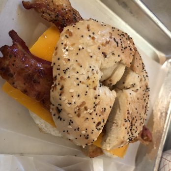 The Devine Cinnamon Roll Deli - The Big Max: 2 eggs, cheddar cheese, black pepper thick bacon, and whole grain mustard spread on an everything bagel - Delis Near Me - Columbia, South Carolina The Devine Cinnamon Roll Deli - The Big Max: 2 eggs, cheddar cheese, black pepper thick bacon, and whole grain mustard spread on an everything bagel - Delis Near Me - Columbia, South Carolina