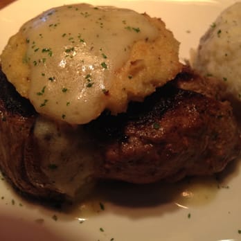 Outback Steakhouse - This is the crab covered steak. That looks like a frozen patty set onto a steak. Nothing like any of the ads. - Steakhouses Near Me - Phoenix, Arizona Outback Steakhouse - This is the crab covered steak. That looks like a frozen patty set onto a steak. Nothing like any of the ads. - Steakhouses Near Me - Phoenix, Arizona