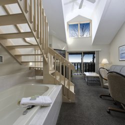 Country House Resort - Second Floor Suite great room area with private water view balcony