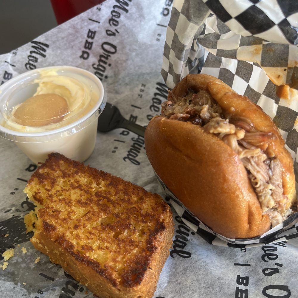 Barbecue pork sandwich, cornbread and banana pudding. Barbecue pork sandwich, cornbread and banana pudding.