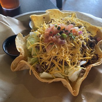 Tapester's Grill - TACO SALAD - house made bowl with taco meat, pico de gallo, cheddar cheese, roasted corn, black beans, lettuce, salsa and poblano sauce - American Near Me - Houston, Texas Tapester's Grill - TACO SALAD - house made bowl with taco meat, pico de gallo, cheddar cheese, roasted corn, black beans, lettuce, salsa and poblano sauce - American Near Me - Houston, Texas