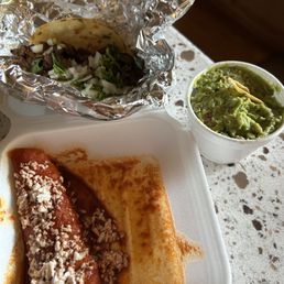 Beef enchilada, and a Carne Sada taco Beef enchilada, and a Carne Sada taco