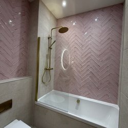 Lomond Bathrooms - Porcelanosa herringbone tiles and premium bathroom installation by Lomond Bathrooms, 284 High Street, Glasgow.