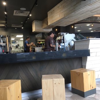Twice Daily - a man standing at a counter in a restaurant - Convenience Stores Near Me - Franklin, Tennessee Twice Daily - a man standing at a counter in a restaurant - Convenience Stores Near Me - Franklin, Tennessee
