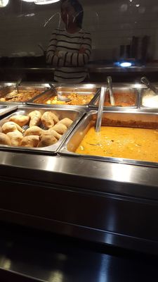 Photo of Rajun Cajun - Chicago, IL, US. Samosas and other assorted food