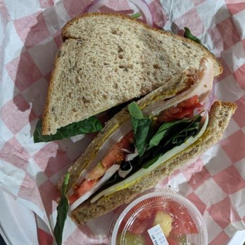Stone Village Market - Turkey sandwich with provolone, spinach, tomato, onion and mustard on multigrain bread. - Grocery Near Me - Fort Davis, Texas Stone Village Market - Turkey sandwich with provolone, spinach, tomato, onion and mustard on multigrain bread. - Grocery Near Me - Fort Davis, Texas