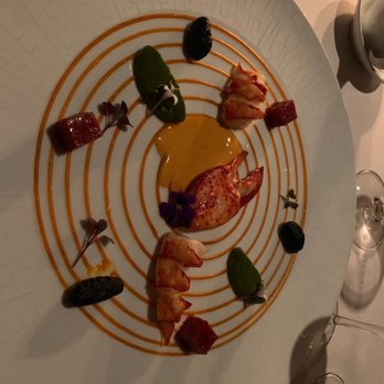 La Mer - Lobster claw with squid ink gnocchi, zucchini paste, chorizo with chorizo cream and tomato chorizo on the plate. - French Near Me - Honolulu, Hawaii La Mer - Lobster claw with squid ink gnocchi, zucchini paste, chorizo with chorizo cream and tomato chorizo on the plate. - French Near Me - Honolulu, Hawaii