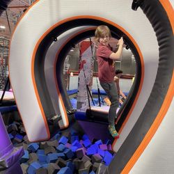 Sky Zone - My son on the ninja course.