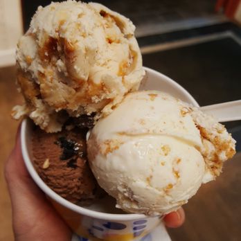 COWS - Top, Peanut butter cup cup, coconut cream pie, and messie bessie at the bottom - Ice Cream & Frozen Yogurt Near Me - Whistler, British Columbia