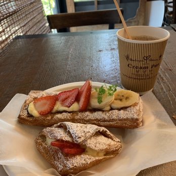 Cream Pan - Strawberry croissant and Strawberry Banana Croissant and cup of coffee. - Bakeries Near Me - Tustin, California Cream Pan - Strawberry croissant and Strawberry Banana Croissant and cup of coffee. - Bakeries Near Me - Tustin, California