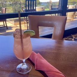 Prickly pear margarita with a window view