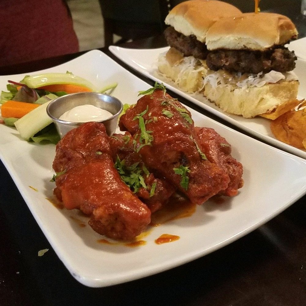 Sangarita's - Chipotle chicken wings in the front, chimi sliders in the back. GET THE SLIDERS!!! - Spanish Near Me - Bayside, New York Sangarita's - Chipotle chicken wings in the front, chimi sliders in the back. GET THE SLIDERS!!! - Spanish Near Me - Bayside, New York