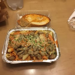 Pasta To Go - Penna pasta with Italian Sausage and their PINK sauce. It's a combination of marinara and Alfredo sauces.