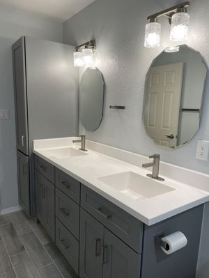North Scottsdale Modern Bathroom Remodel - Transform your bathroom into a spa-like retreat! EK HomeBuilders recently completed a stunning renovation that's sure to impress. From the sleek cabinetry and luxurious countertops to the spacious shower with rainfall showerhead, every detail is thoughtfully designed for both style and functionality. Experience the difference of working with a professional team dedicated to creating beautiful, high-quality spaces. North Scottsdale Modern Bathroom Remodel - Transform your bathroom into a spa-like retreat! EK HomeBuilders recently completed a stunning renovation that's sure to impress. From the sleek cabinetry and luxurious countertops to the spacious shower with rainfall showerhead, every detail is thoughtfully designed for both style and functionality. Experience the difference of working with a professional team dedicated to creating beautiful, high-quality spaces.
