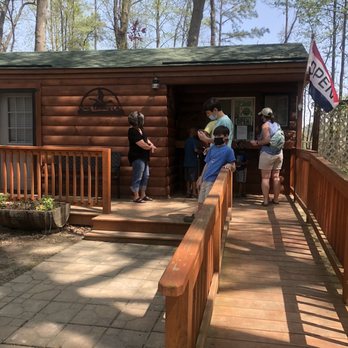 Duck Landing Cafe - a group of people standing outside of a cabin - Coffee & Tea Near Me - Scotland Neck, North Carolina Duck Landing Cafe - a group of people standing outside of a cabin - Coffee & Tea Near Me - Scotland Neck, North Carolina