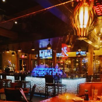 Sushi Axiom - Bar is empty but plenty of people in restaurant. - Sushi Bars Near Me - North Richland Hills, Texas