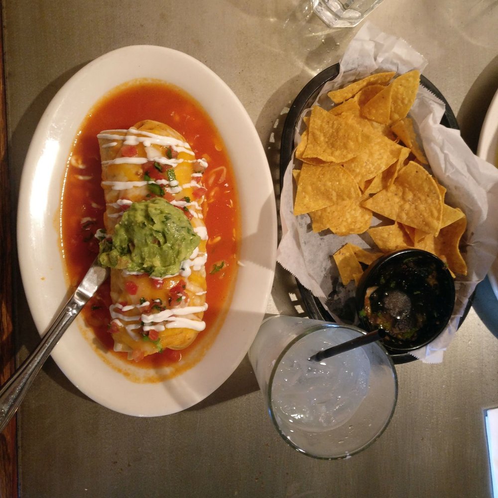 Villa Escondida Restaurant and Bar - The wet burrito and house chips with salsa - Mexican Near Me - Seattle, Washington Villa Escondida Restaurant and Bar - The wet burrito and house chips with salsa - Mexican Near Me - Seattle, Washington