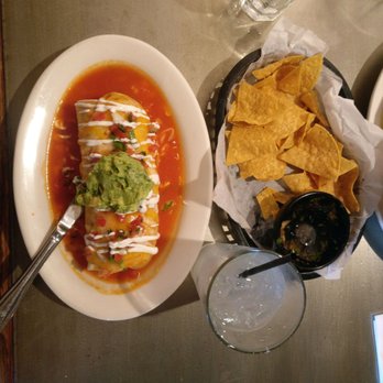 Villa Escondida Restaurant and Bar - The wet burrito and house chips with salsa - Mexican Near Me - Seattle, Washington Villa Escondida Restaurant and Bar - The wet burrito and house chips with salsa - Mexican Near Me - Seattle, Washington