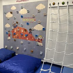 We Rock The Spectrum - Our Rock Wall featuring THE infamous Rock (GBO!) & Rope Wall. Each have crash pads below for extra safety.