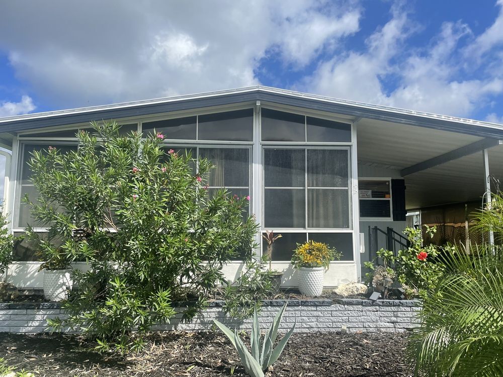 Slide of All Weather Roofing