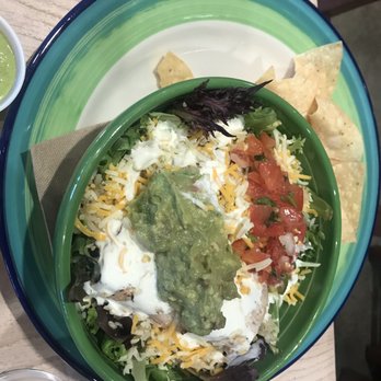 Dos Coyotes Border Cafe - Mahi mahi plate on lettuce as is with all the sides in the bowl. - Tex-Mex Near Me - San Ramon, California Dos Coyotes Border Cafe - Mahi mahi plate on lettuce as is with all the sides in the bowl. - Tex-Mex Near Me - San Ramon, California