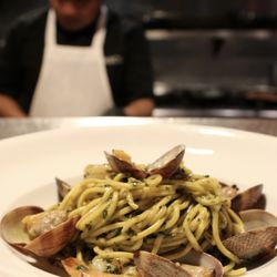 Di Mauro's Italian Restaurant & Bar - Fresh Clams and Shrimps with homemade Spaghetti in a Pesto Sauce.
