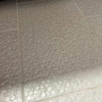 MXCP Construction - a kitchen floor with a tile pattern - General Contractors Near Me