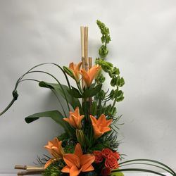 Crescent Floral & Gifts - Contemporary floral art with lily and bamboo