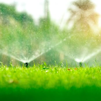 Hodges Irrigation - a sprinkler spraying water on a lawn - Irrigation Near Me Hodges Irrigation - a sprinkler spraying water on a lawn - Irrigation Near Me