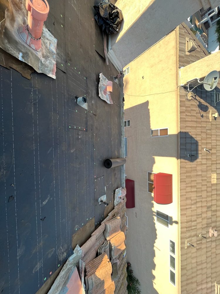 Slide of AVO Roofing Services