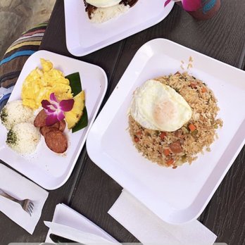 Photo of Barefoot Beach Cafe - Honolulu, HI, United States. The surfers fried rice (Lower right), meat and eggs (lower left) and the patty on rice (top). As well as the açaí smoothie.