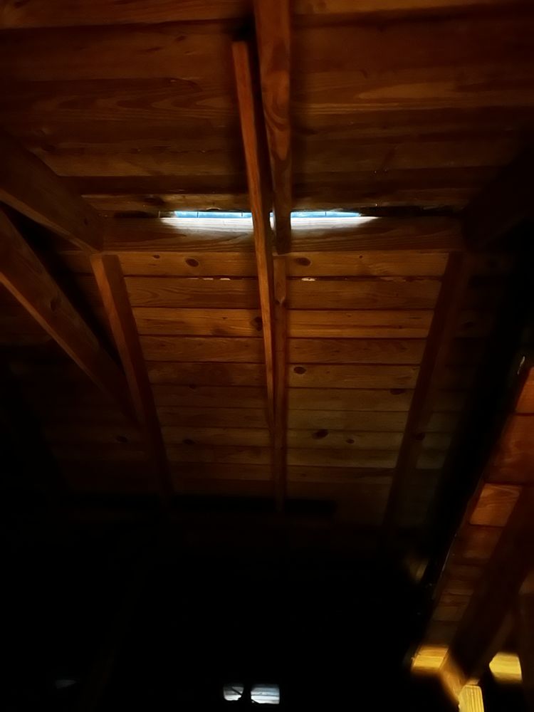 Slide of Gulliver Roofing