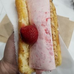 Here's what a wonder dog looks like, a giant roll of ice cream sandwiched in a sweet donut! Awesome combo! Here's what a wonder dog looks like, a giant roll of ice cream sandwiched in a sweet donut! Awesome combo!