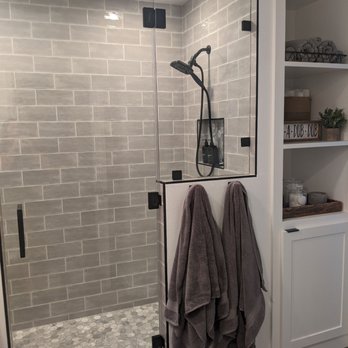 EDW Construction - Double shower & custom linen cabinet - General Contractors Near Me