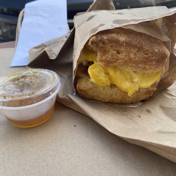 Bird Bird Biscuit - Scrambled eggs and bacon biscuit with spicy honey is so good! - Breakfast & Brunch Near Me - Austin, Texas