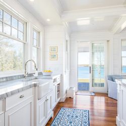 Lewis & Weldon - Custom kitchen design featuring inset cabinetry with applied molding details and a coffered ceiling. Overlooking Buzzards Bay.
