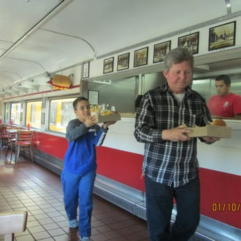 Carneys - My dad and my son. Food is ready :9 - Burgers Near Me - Studio City, California