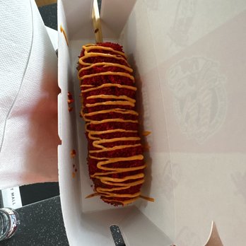 Two Hands Corn Dogs Town East Mall - a person holding a hot dog - Korean Near Me - Mesquite, Texas Two Hands Corn Dogs Town East Mall - a person holding a hot dog - Korean Near Me - Mesquite, Texas