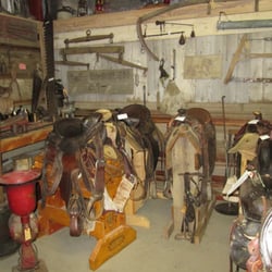 Lambert Historical Society - Saddles and farm tools