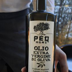 Filario - Waiter presenting this EVOO like it was a fine wine. I can still taste the uniqueness