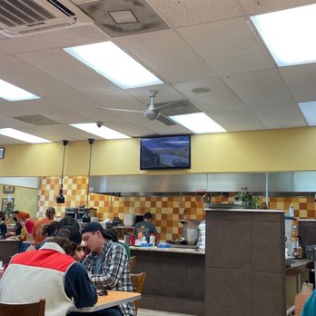 Omelette Cafe - people sitting at tables in a restaurant - Breakfast & Brunch Near Me - Richmond Hill, Georgia