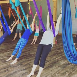 Root Sup & Fitness - Rib hang in Aerial Yoga