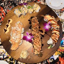 ART Burger Sushi Bar - Spicy tuna crunch roll, Bond roll, Zach attack, Tiger roll.