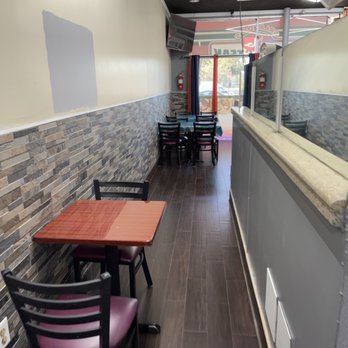 Orlando PhillySteak - a restaurant with tables and chairs - Sandwiches Near Me - Orlando, Florida Orlando PhillySteak - a restaurant with tables and chairs - Sandwiches Near Me - Orlando, Florida