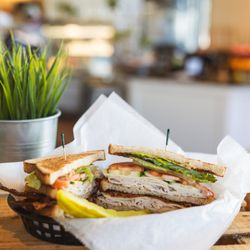Ollies's Market & Deli - Ollie's Club Sandwich, piled high with a pickle on the side