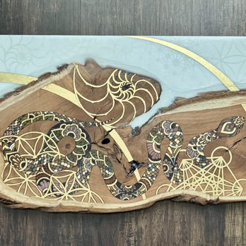 Anne Shackelford - Opal resin on Texas mesquite with pyrography, ink, and metal leaf. chrysalisaustin.com/collection/naga - Art Galleries Near Me Anne Shackelford - Opal resin on Texas mesquite with pyrography, ink, and metal leaf. chrysalisaustin.com/collection/naga - Art Galleries Near Me