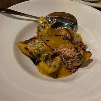 Il Nido - Seasonal large ravioli dish with squash puree - the best dish on the menu by far - Italian Near Me - Seattle, Washington
