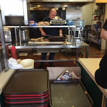 Baker's Ribs - Slicing up the goodies. - Barbeque Near Me - Eden Prairie, Minnesota Baker's Ribs - Slicing up the goodies. - Barbeque Near Me - Eden Prairie, Minnesota
